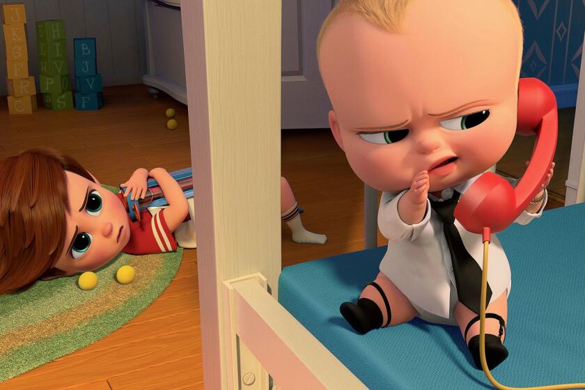 This image released by DreamWorks Animation shows characters Tim, voiced by Miles Bakshi, and Boss Baby, voiced by Alec Baldwin in a scene from the animated film, "The Boss Baby." (DreamWorks Animation via AP)