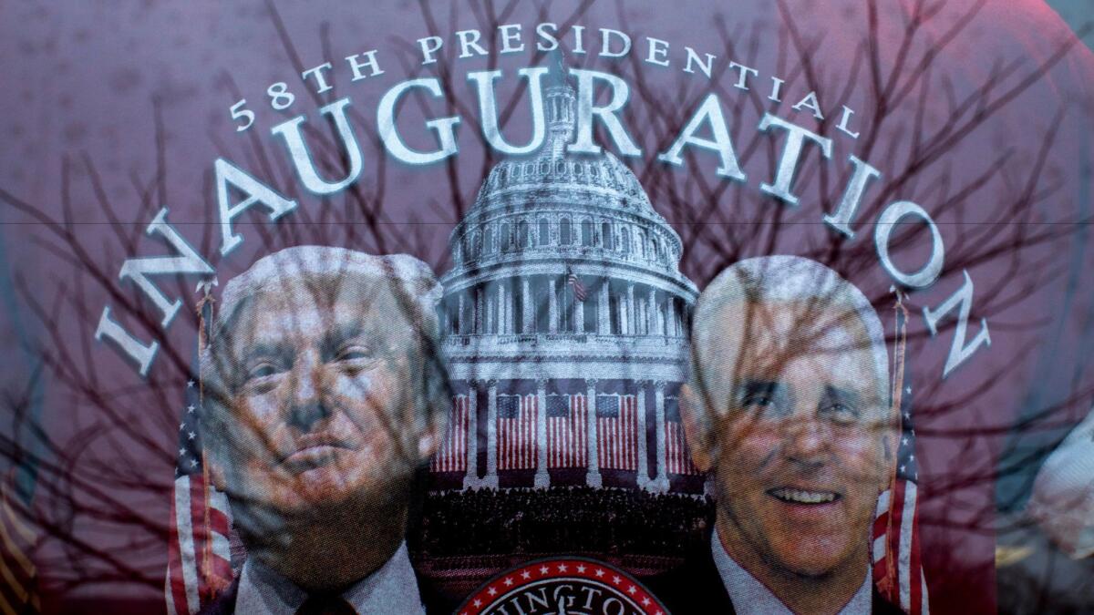 T-shirts and other Donald Trump paraphernalia are displayed in the window of White House Gifts in Washington, D.C. on Tuesday. Trump will be sworn in as the 45th U.S. president Friday.