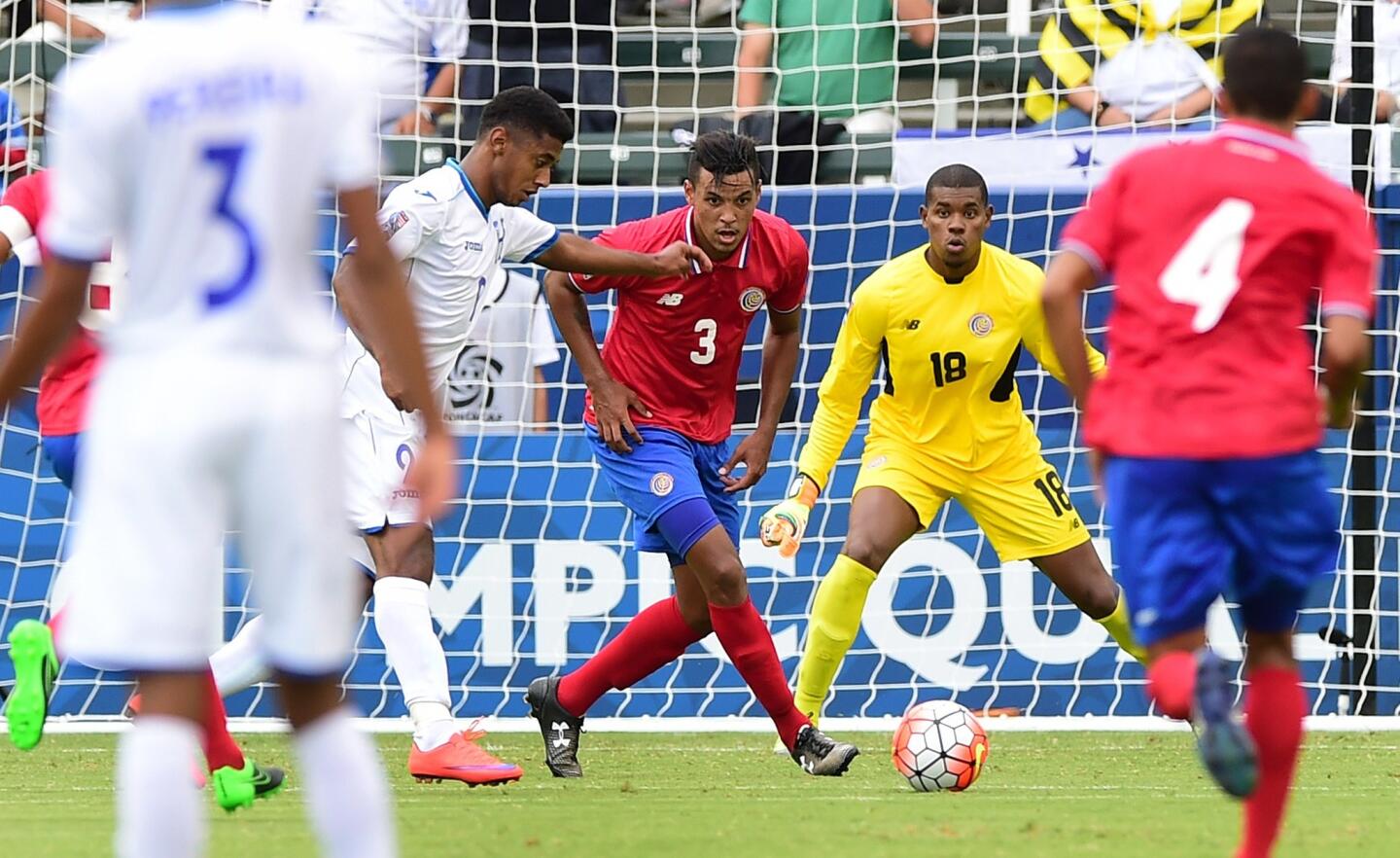 Anthony Lozano of Honduras winds up his shot to score for a 1-0 lead as Julio Cascante (#3) and goalkeeper Darryl Parker of Costa Rica look on on October 4, 2015 in Carson, California during their CONCACAF Men's Olympic qualifying match. AFP PHOTO / FREDERIC J. BROWNFREDERIC J. BROWN/AFP/Getty Images ** OUTS - ELSENT, FPG, CM - OUTS * NM, PH, VA if sourced by CT, LA or MoD **