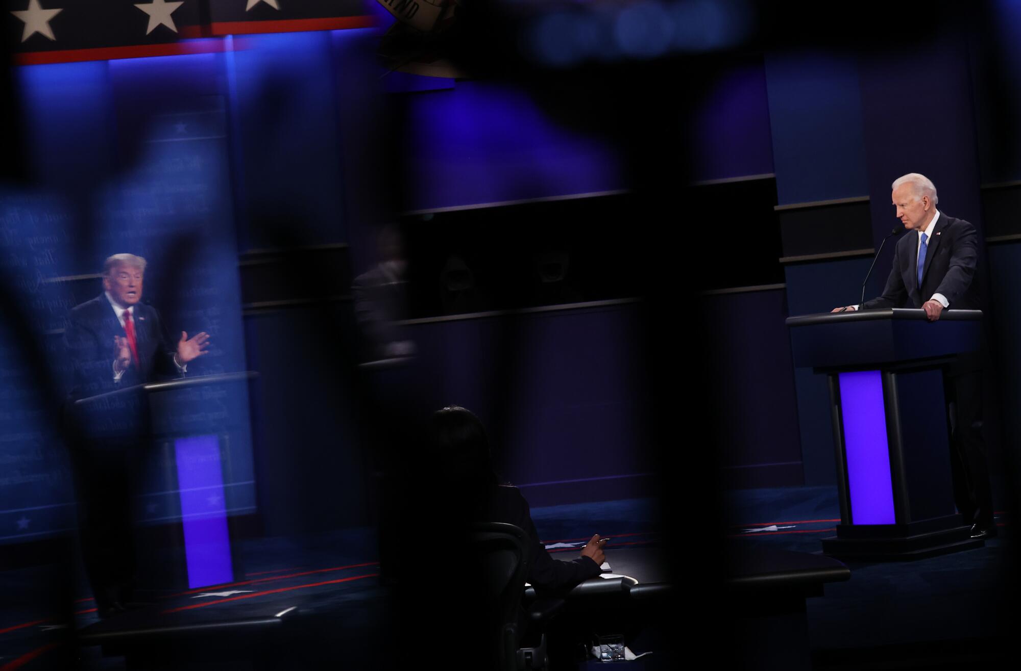 President Trump and Joe Biden seen onstage at the debate