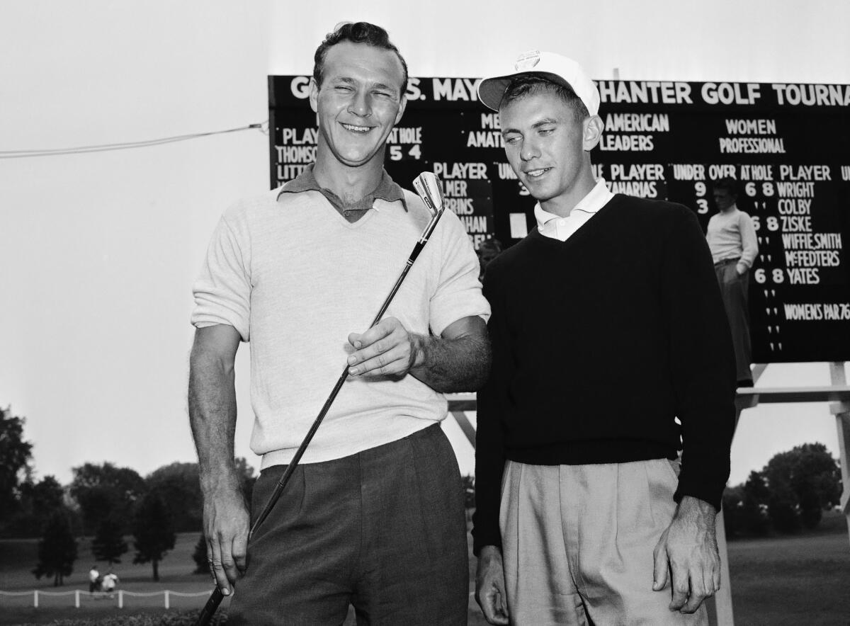 Arnold Palmer, left, and Eddie Merrins in 1954, when they finished 1-2 in the All American amateur golf tournament.