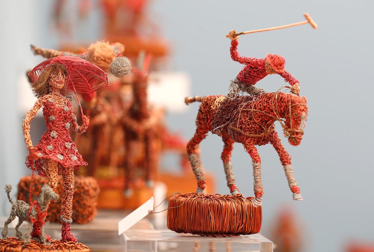 Wire sculptures by artist Karapet "Karo" Kouyoumjan, including "The Jockey."