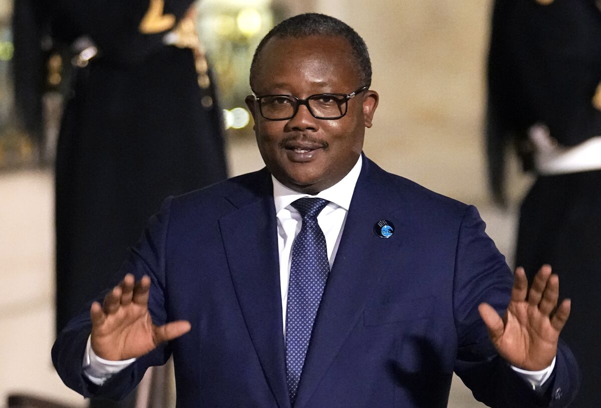 FILE - President of Guinea-Bissau Umaro Sissoco Embalo arrives for a dinner at the Elysee Palace as part of the Paris Peace Forum, in Paris, Nov. 11, 2021. Heavy gunfire erupted Tuesday Feb. 1, 2022 near the Government Palace in Guinea-Bissau's capital, witnesses said, raising fears of a coup attempt in this West African country with a long history of military takeovers. (AP Photo/Michel Euler, file)