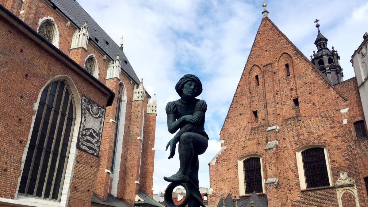 A statue of a medieval student pays tribute to Krakow's heritage as a university town.