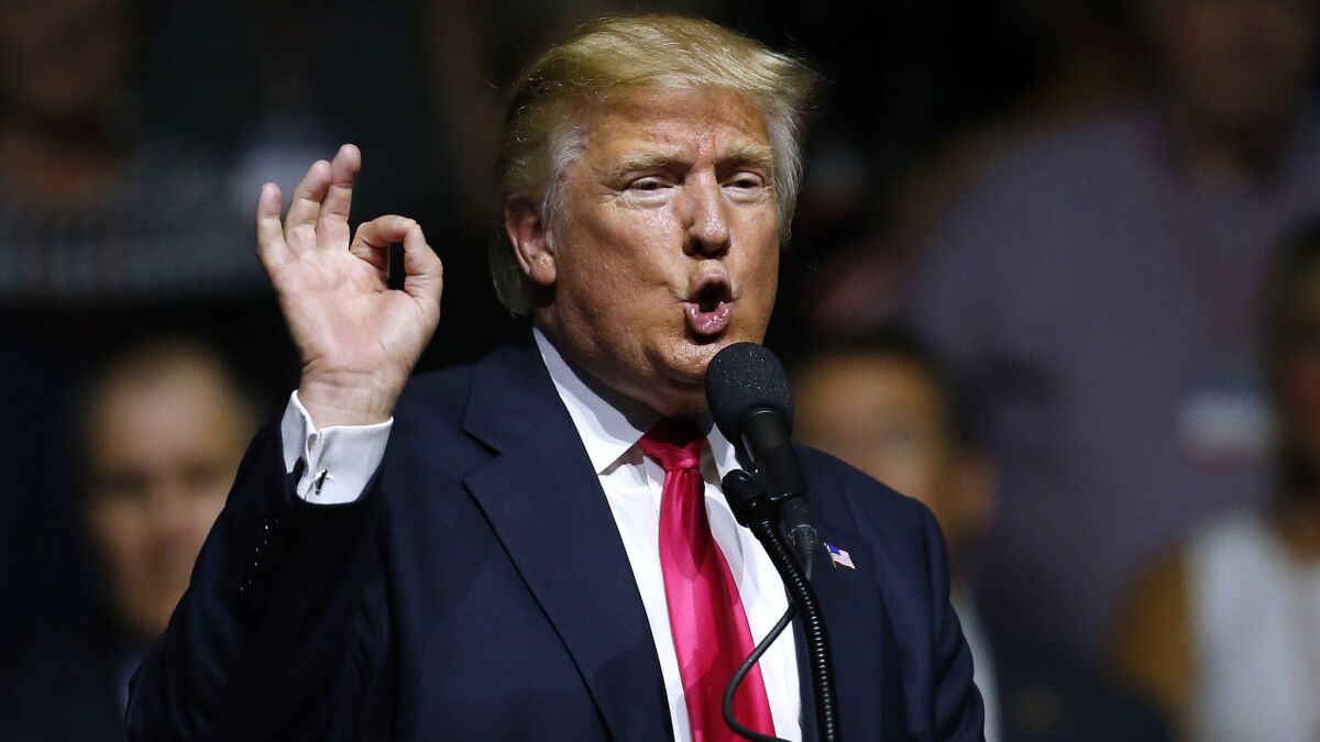 Donald Trump speaks at a rally in Jackson, Miss.