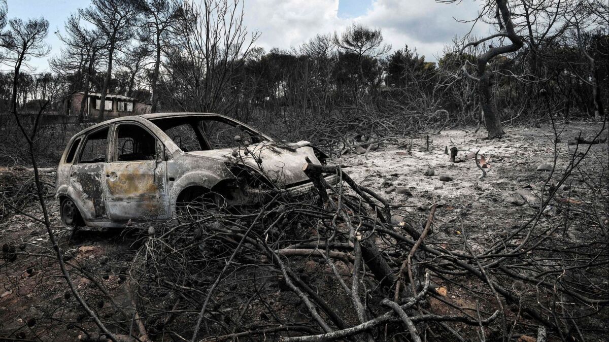 A burned property in the seaside Greek resort of Mati, near Athens, where a wildfire killed more than 80 people.