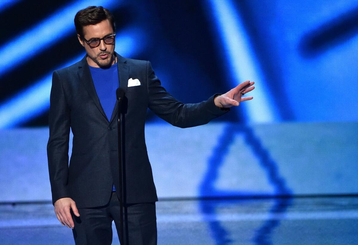 Robert Downey Jr. accepts the favorite movie actor award at the 2015 People's Choice Awards.