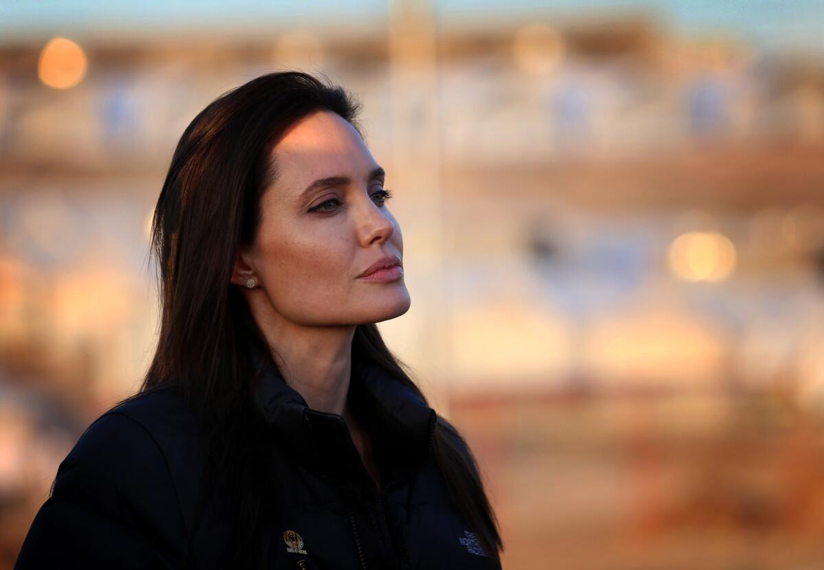 Actress Angelina Jolie visits a camp for displaced Iraqis in Khanke, a few miles from the Turkish border, in January. Jolie announced in a New York Times op-ed Tuesday that she had undergone a second elective surgery to deal with her genetic cancer risk.