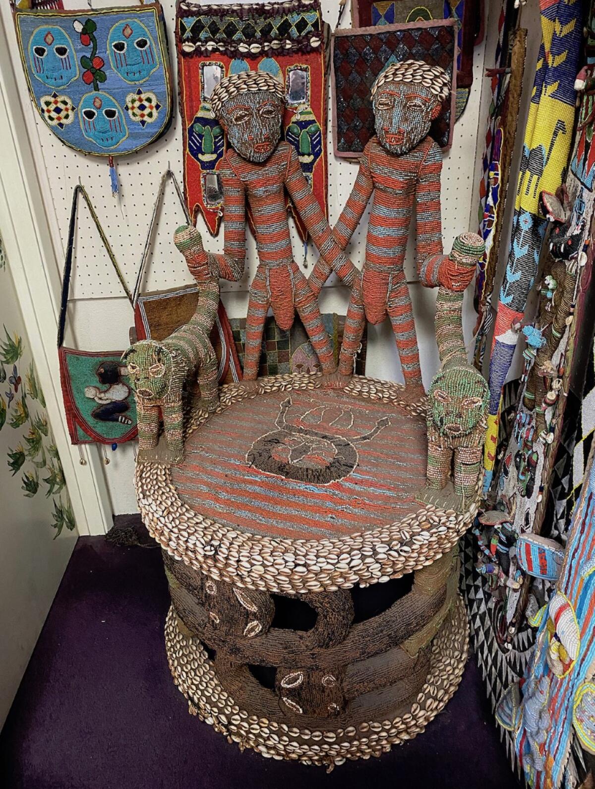 An African King’s Chair, from the Yoruba tribe of Nigeria, now sitting outside the museum in the back of the store.