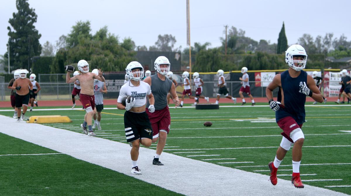 Ocean View players warm up during practice on Aug. 7.