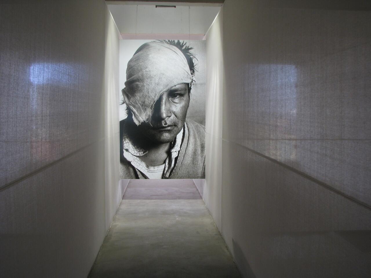 The simple, gut-wrenching entrance to an exhibition that commemorated the nearly 70,000 lives claimed by Peru's internal conflict in the '80s and '90s. The image is from a visit I made to the site in 2009.