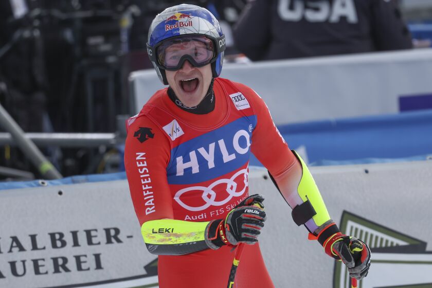 Switzerland's Marco Odermatt arrives at the finish area during an alpine ski, men's World Cup super-G, in Cortina d'Ampezzo, Italy, Saturday, Jan. 28, 2023. (AP Photo/Alessandro Trovati)