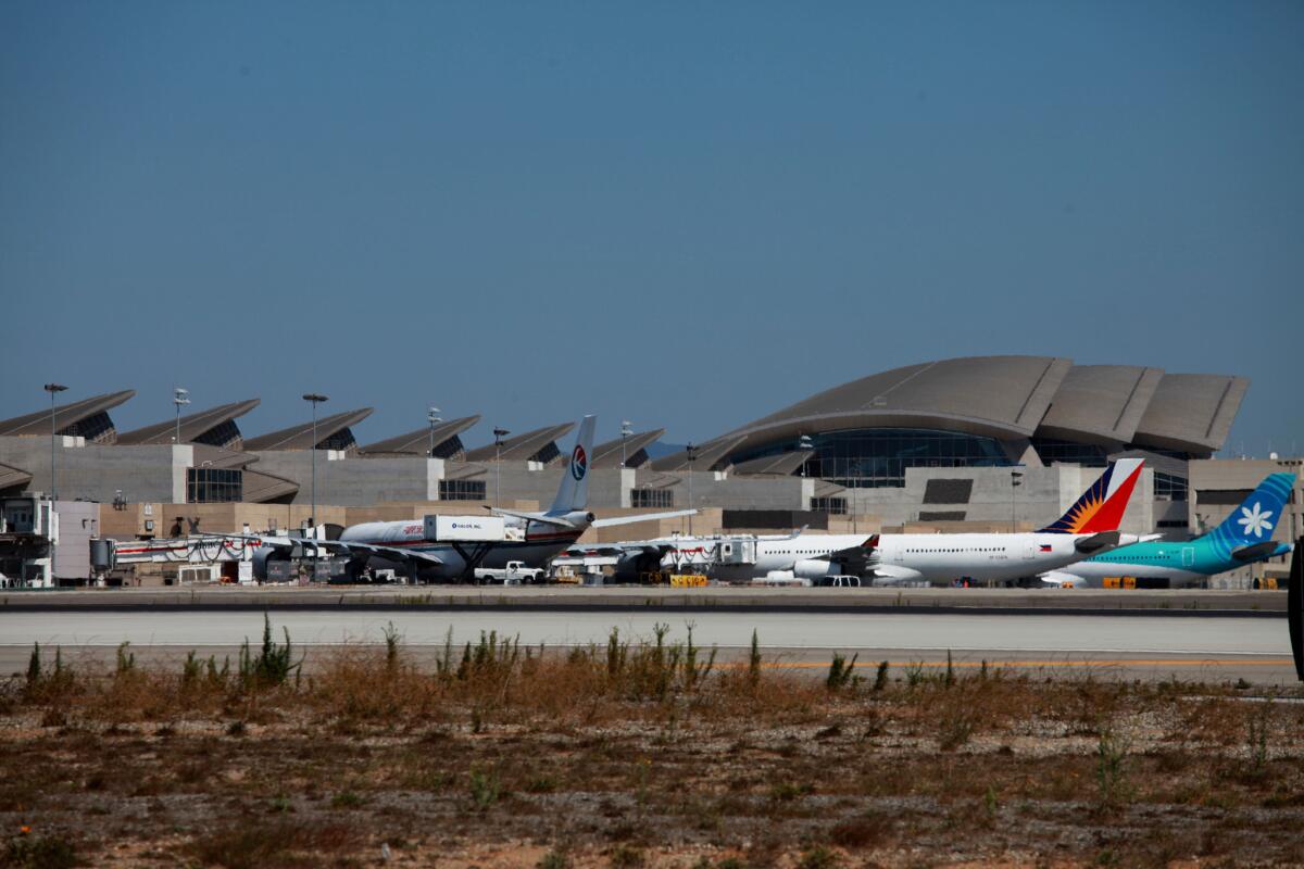 Aircraft line the Tom Bradley International Terminal at Los Angeles International Airport.