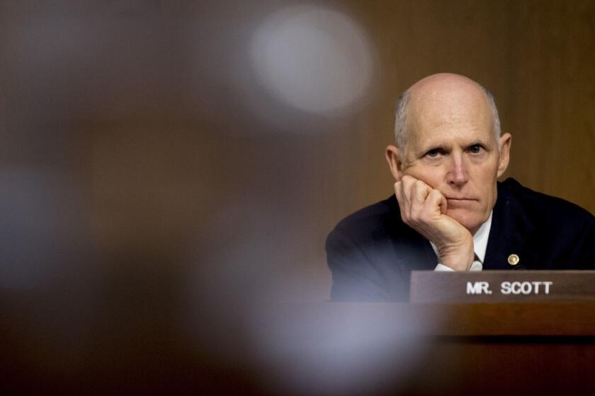 Sen. Rick Scott, R-Fla., listens as U.S. Central Command Commander Gen. Joseph Votel testifies at a Senate Armed Services Committee hearing on Capitol Hill, Tuesday, Feb. 5, 2019, in Washington. (AP Photo/Andrew Harnik)
