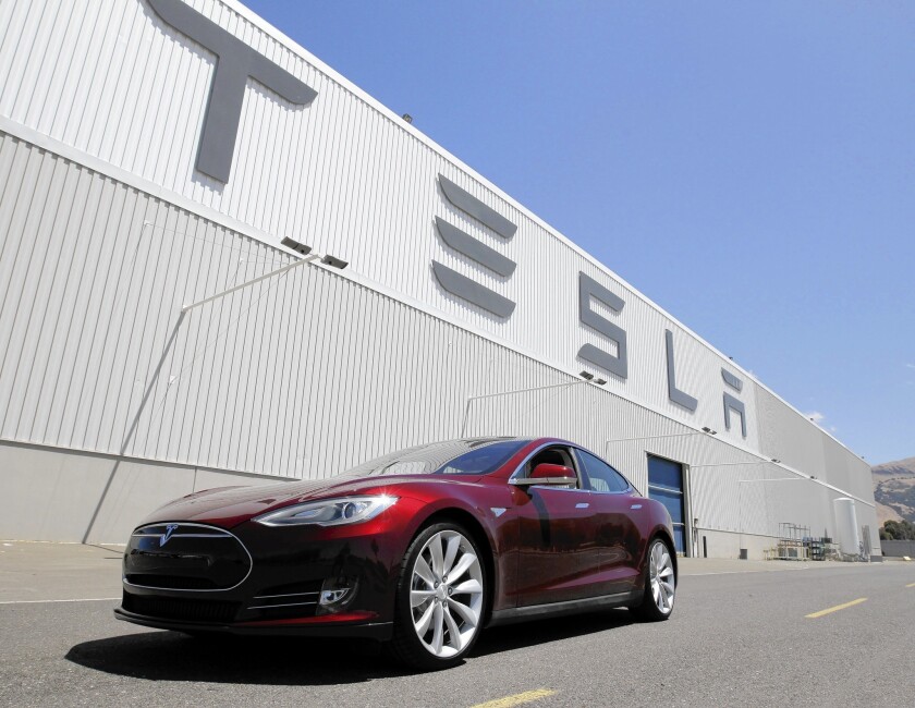 Tesla Plans To Raise Almost 2 Billion To Build Battery