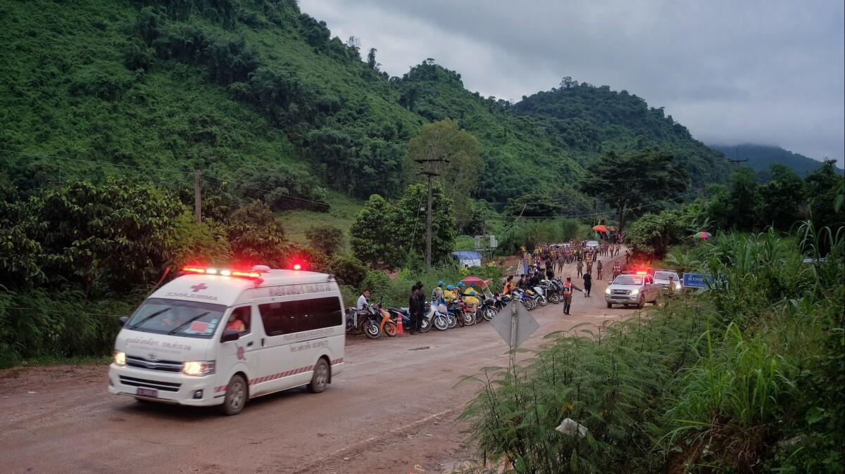 An ambulance carries one of the boys rescued from Thailand's Tham Luang Nang Non cave heads toward a hospital on July 8, 2018. A new report confirms that all 12 boys and their soccer coach were drugged with ketamine and were unconscious during their rescue dives.