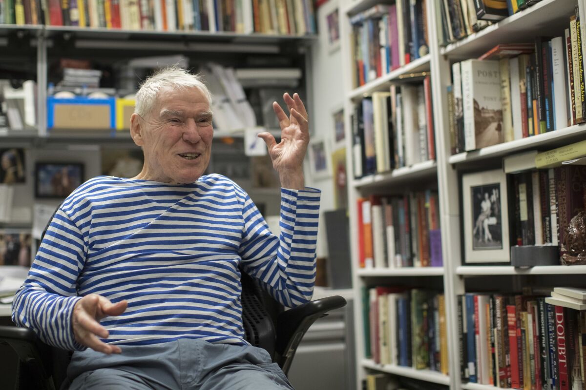 FILE - Dancer-choreographer Jacques d'Amboise appears during an interview in his office at the National Dance Institute in New York on March 3, 2018. D'Amboise, who grew up on the streets of upper Manhattan to become one of the world's premier classical dancers at New York City Ballet and spent the last four and a half decades providing free dance classes to city youth at his National Dance Institute, died Sunday, May 2, 2021. He was 86. His death was confirmed by Ellen Weinstein, director of the institute. (AP Photo/Mary Altaffer, File)