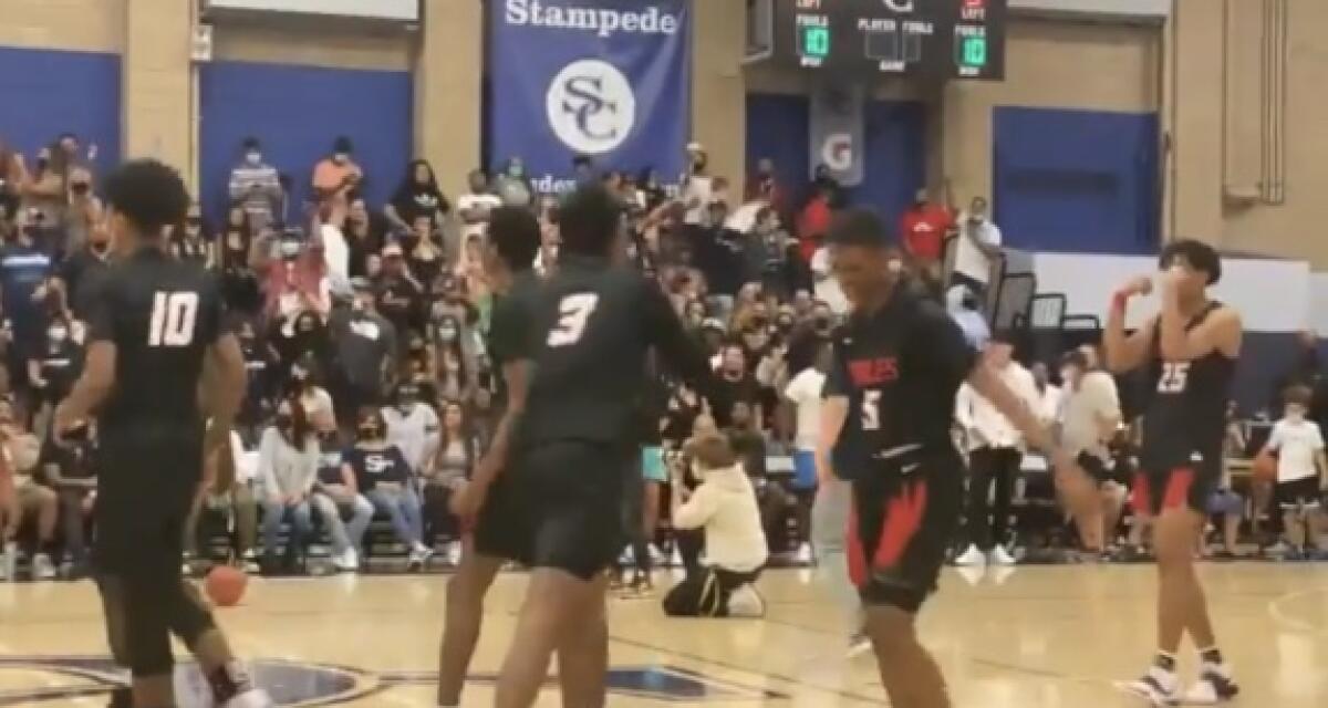 Etiwanda players celebrate 82-76 win over Sierra Canyon.