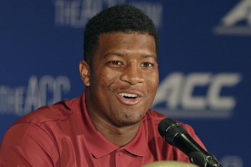 Florida State quarterback Jameis Winston answers a question during an Atlantic Coast Conference news conference on July 20.