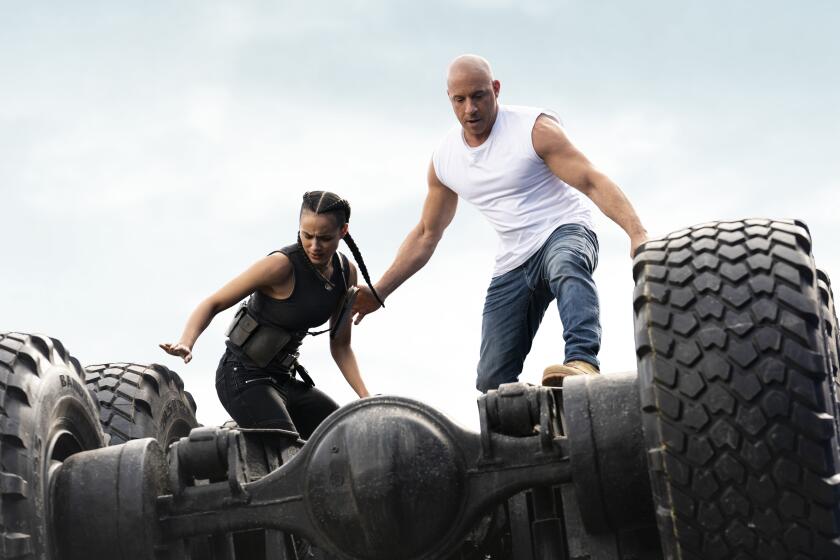 (from left) Ramsey (Nathalie Emmanuel) and Dom (Vin Diesel) in "F9," directed by Justin Lin.