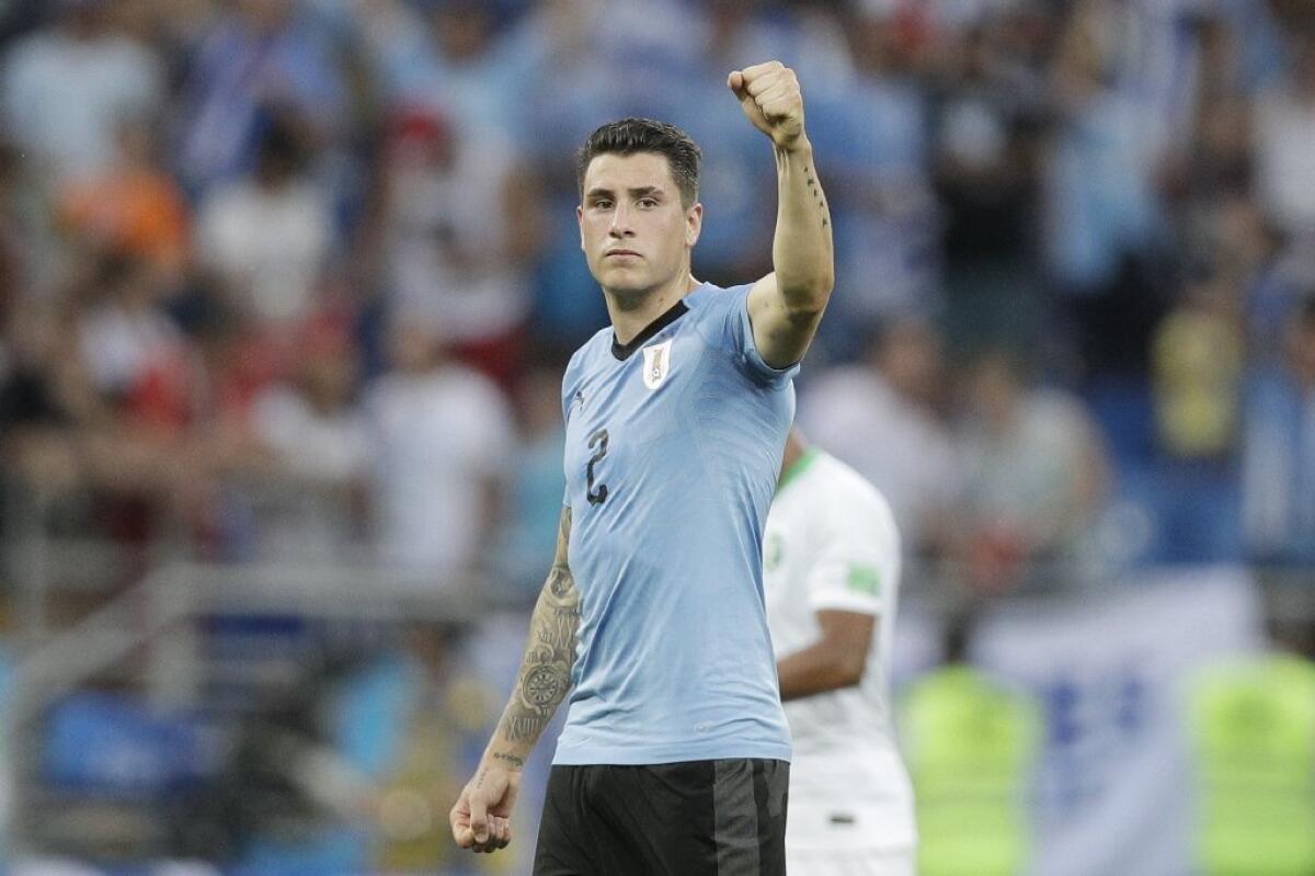 Uruguay defender Jose Maria Gimenez celebrates at the end of a Group A match against Saudi Arabia on June 20.