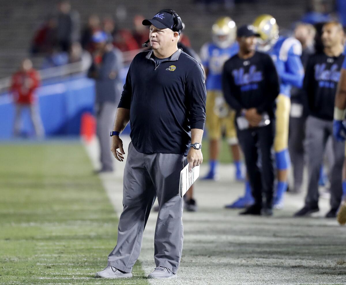 UCLA head coach Chip Kelly watches his Bruins football team go down to defeat against Utah in the closing moments of the fourth quarter on Oct. 26 at the Rose Bowl.