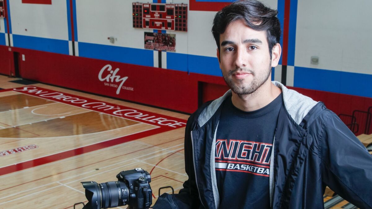 SDSU student David Pradel stands in the San Diego City College gym that sparked a documentary on the team that won the 2017 California junior-college championship.