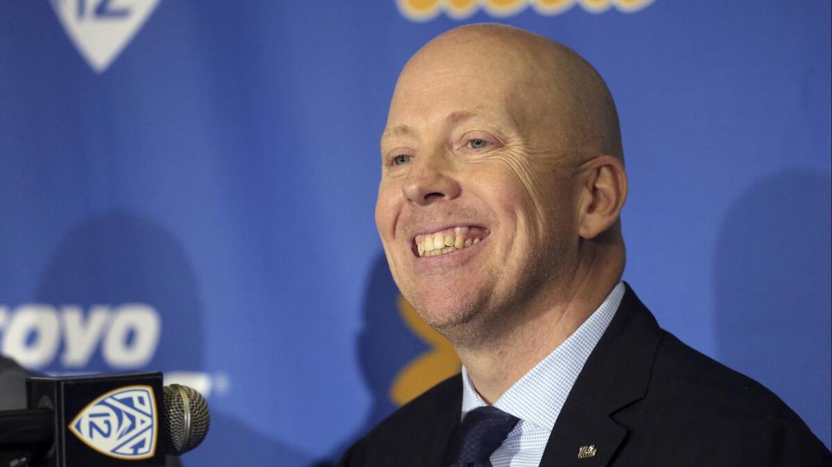 UCLA men's basketball coach Mick Cronin smiles during his introductory news conference in April. Cronin has finalized his coaching staff for his first season in Westwood.