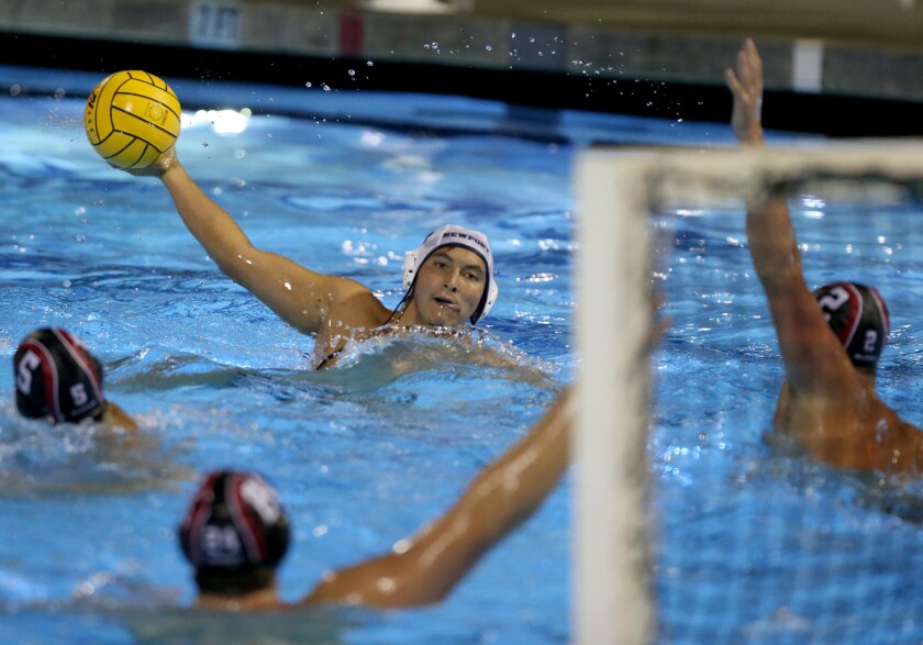 Newport Harbor's Makoto Kenney attempts a shot against Harvard-Westlake in the CIF Southern Section Division 1 final on Saturday at Woollett Aquatics Center in Irvine.