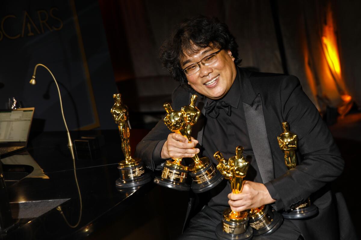 Bong Joon Ho, winner of the director, original screenplay and best picture Oscars for "Parasite," which also won for international feature, at the Academy Awards Governors Ball.