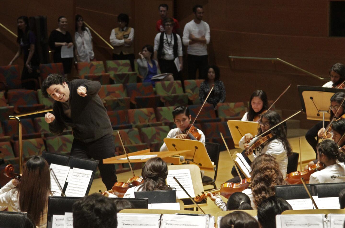 Gustavo Dudamel conducts Youth Orchestra Los Angeles at Walt Disney Concert Hall. More than 700 students are enrolled in YOLA.