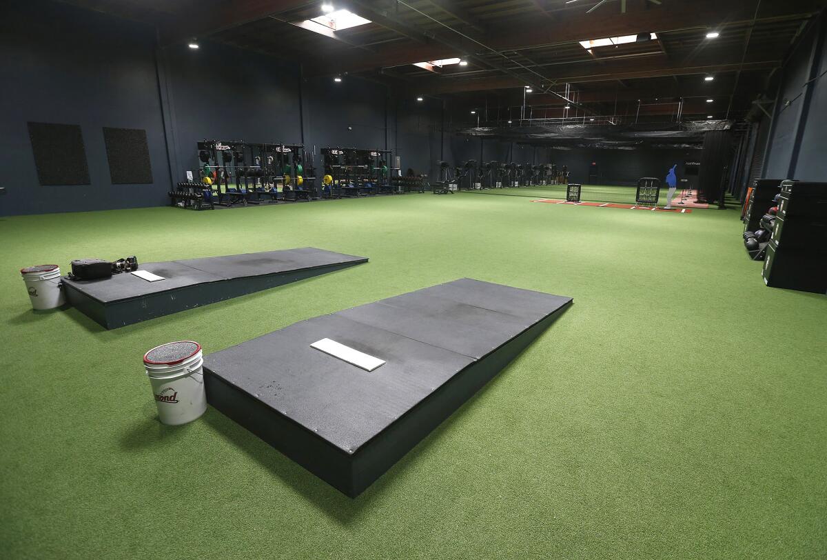 Two pitching mounds are featured at the Clubhouse baseball facility in Costa Mesa.