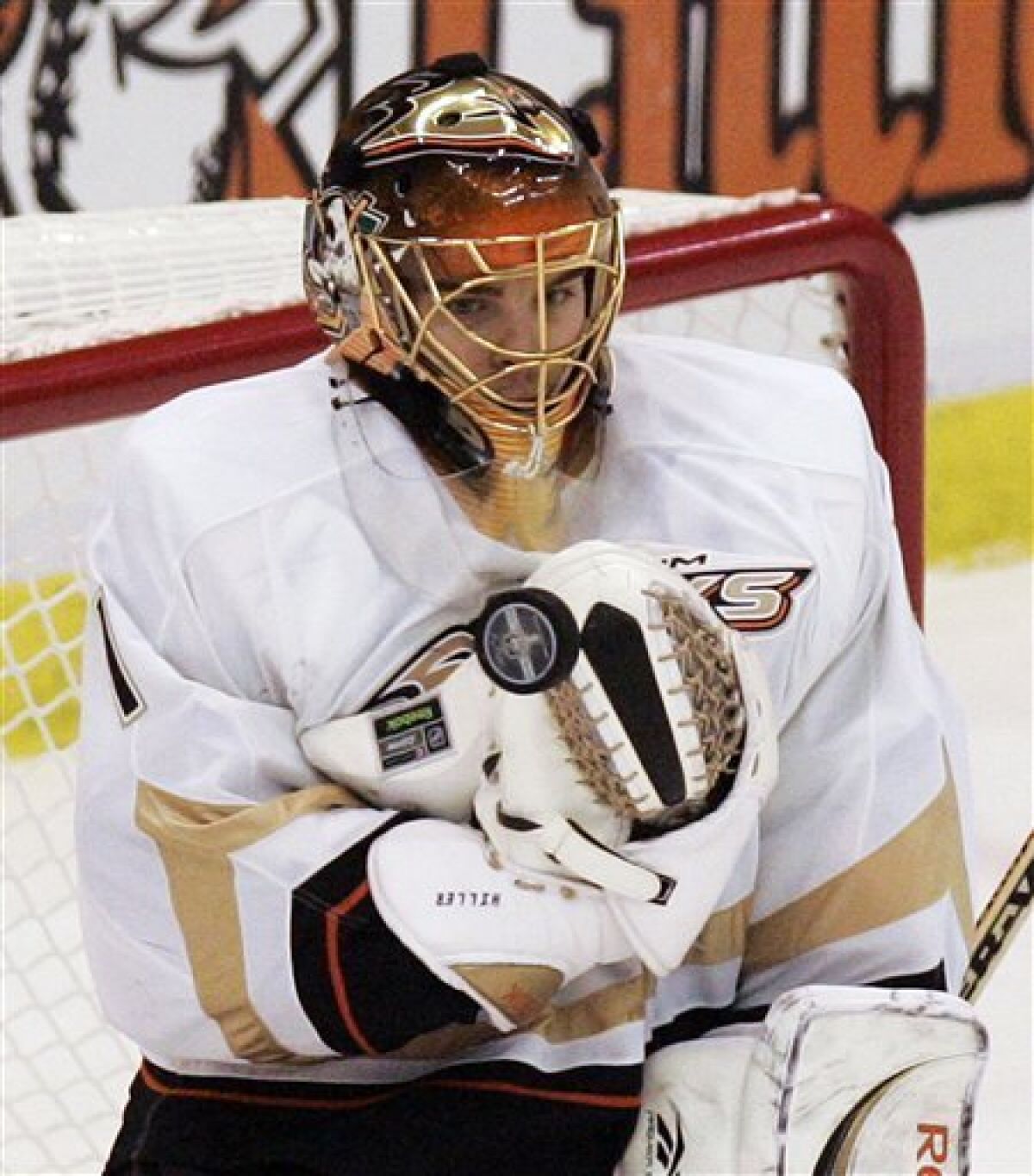 Anaheim Ducks goalie Jonas Hiller (1), of Switzerland, deflects a shot-on-goal during the first period of Game 2 of a second-round NHL hockey playoff series, Sunday, May 3, 2009, in Detroit. (AP Photo/Carlos Osorio)
