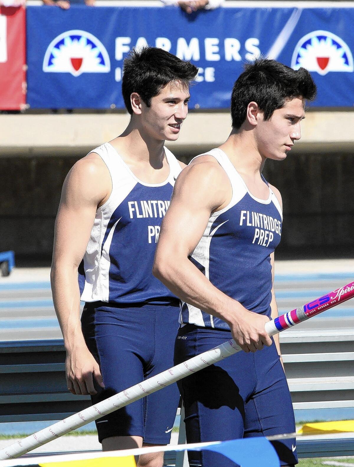 Flintridge Prep's Barrett Weiss, right, joins brother Gareth in qualifying for state with a vault of 15-2 during the CIF-SS Masters Meet at Cerritos College on Friday, May 30, 2014.