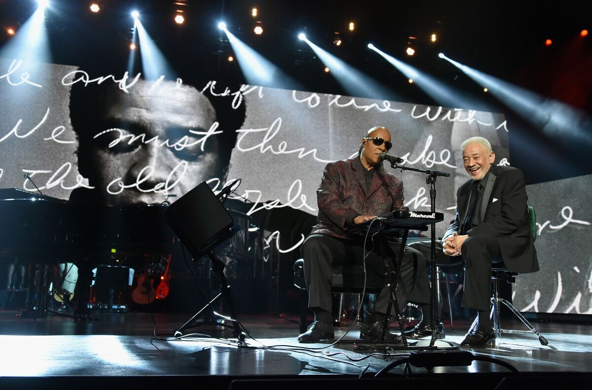 Stevie Wonder and Bill Withers perform onstage during the 30th Annual Rock And Roll Hall Of Fame Induction Ceremony at Public Hall on April 18, 2015 in Cleveland, Ohio.
