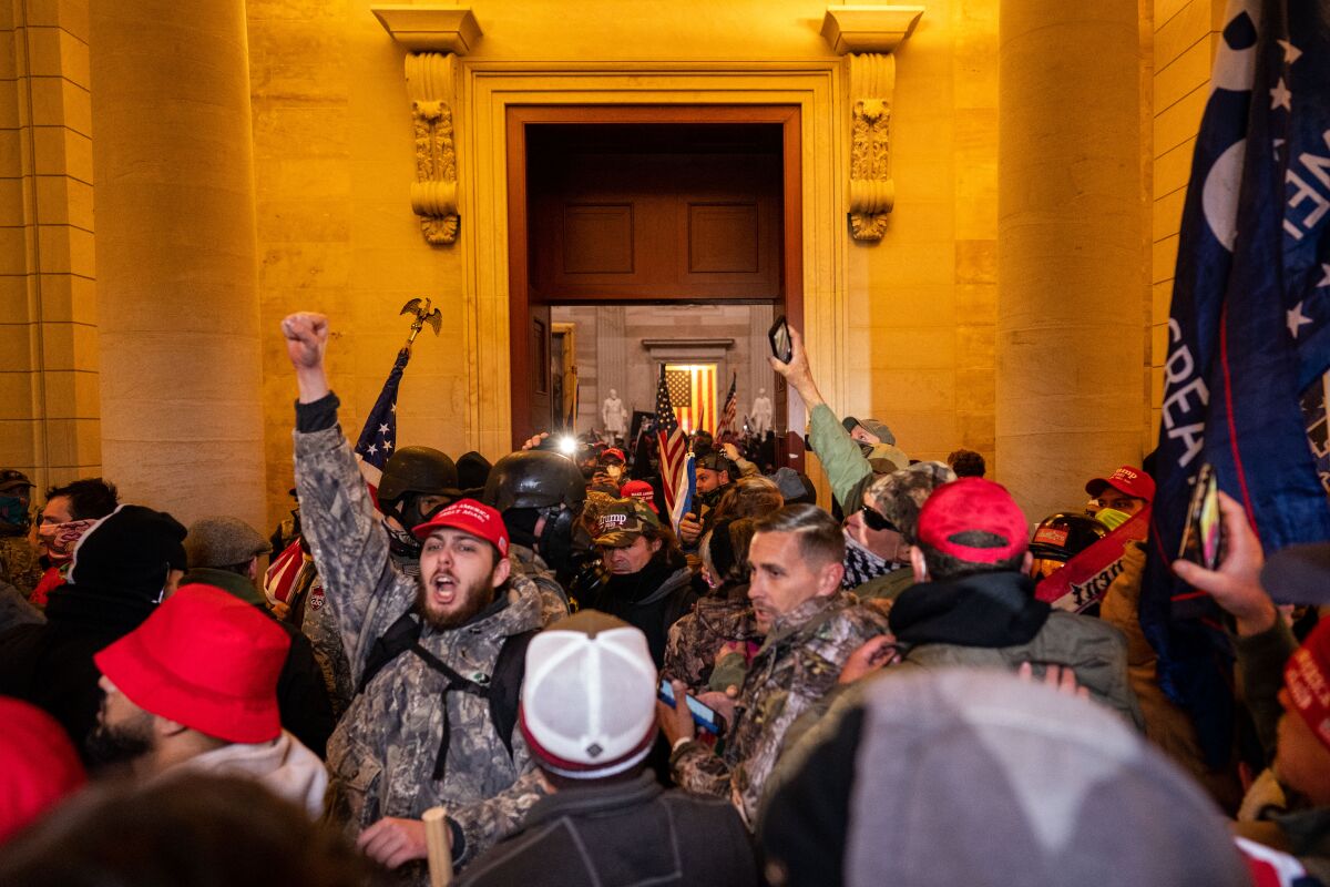 A mob celebrates after breaking into the U.S. Capitol