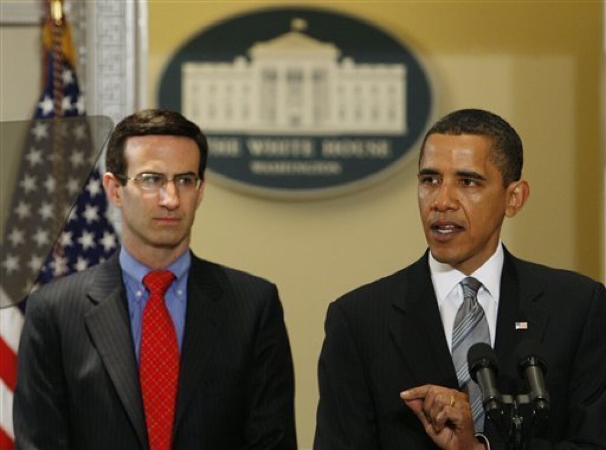 President Barack Obama, accompanied by Budget Director Peter Orszag, speaks about the fiscal 2010 federal budget, Thursday, May 7, 2009, in the Eisenhower Executive Office Building across from the White House in Washington. (AP Photo/Charles Dharapak)