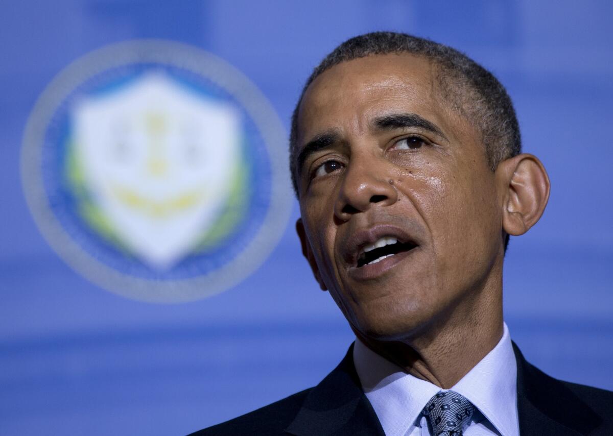 President Obama speaks at the Federal Trade Commission on Monday. He proposed requiring companies to notify customers within 30 days of data breaches.