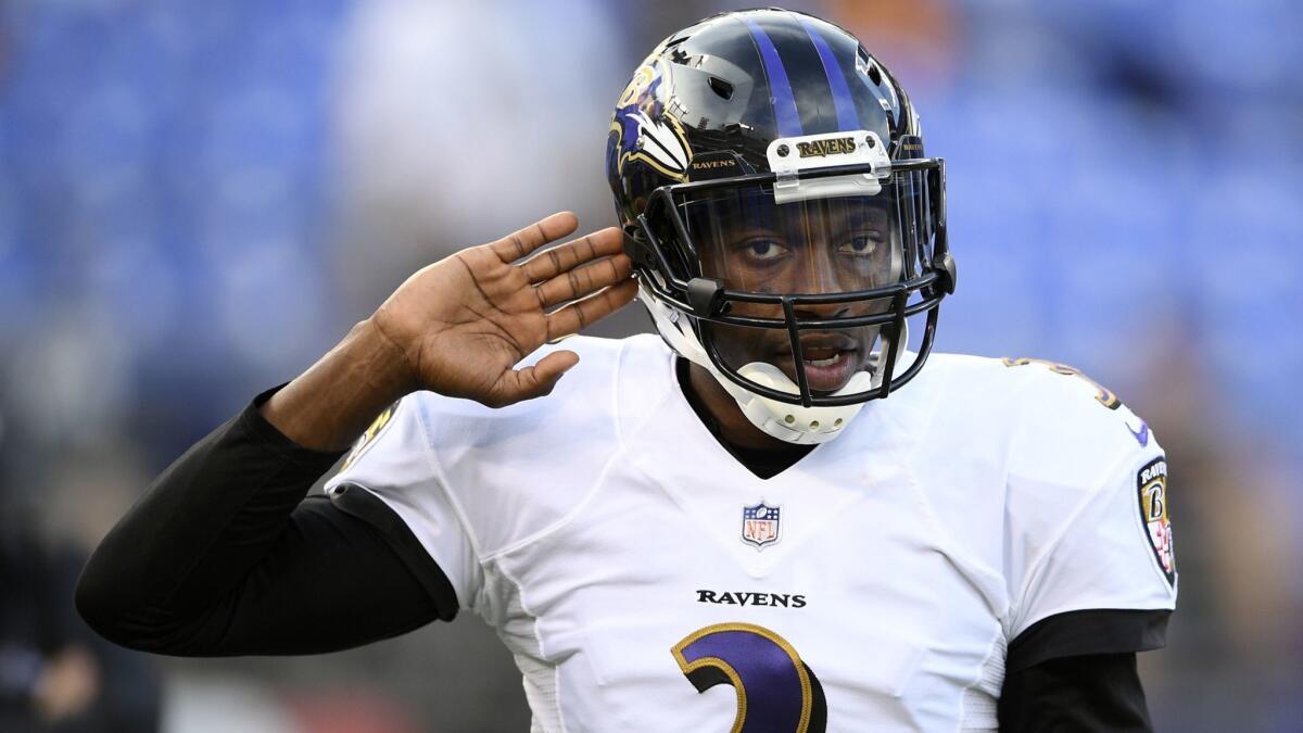 Baltimore quarterback Robert Griffin III warms up before a preseason game against Washington on Aug. 30.