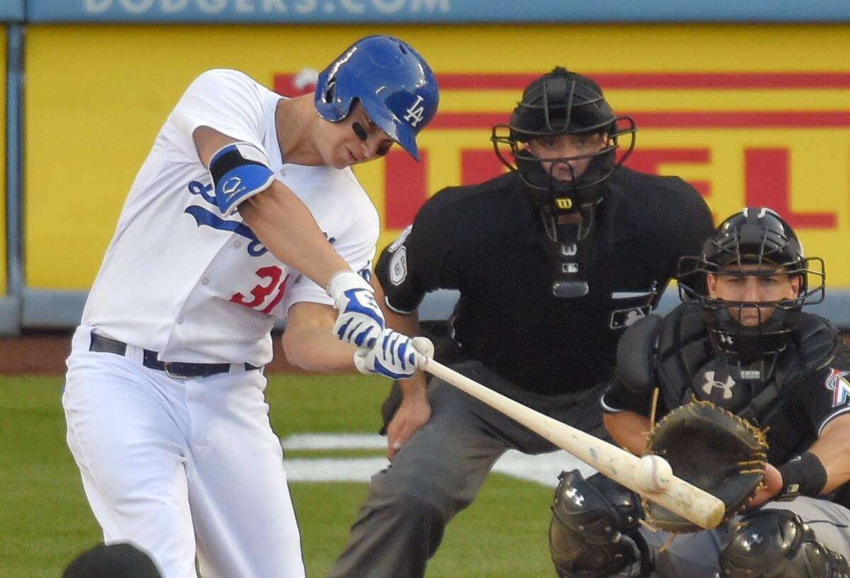 Joc Pederson hits a home run against Miami in Dodger Stadium on May 13.