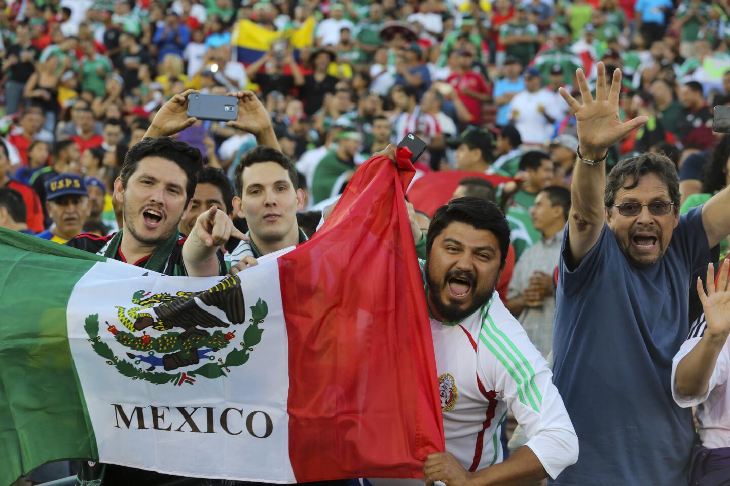 Mexico fans in a soccer friendly match against Ecuador, March 28, 2015, at Los Angeles Memorial Coliseum in Los Angeles. (AP Photo/Ringo H.W. Chiu)