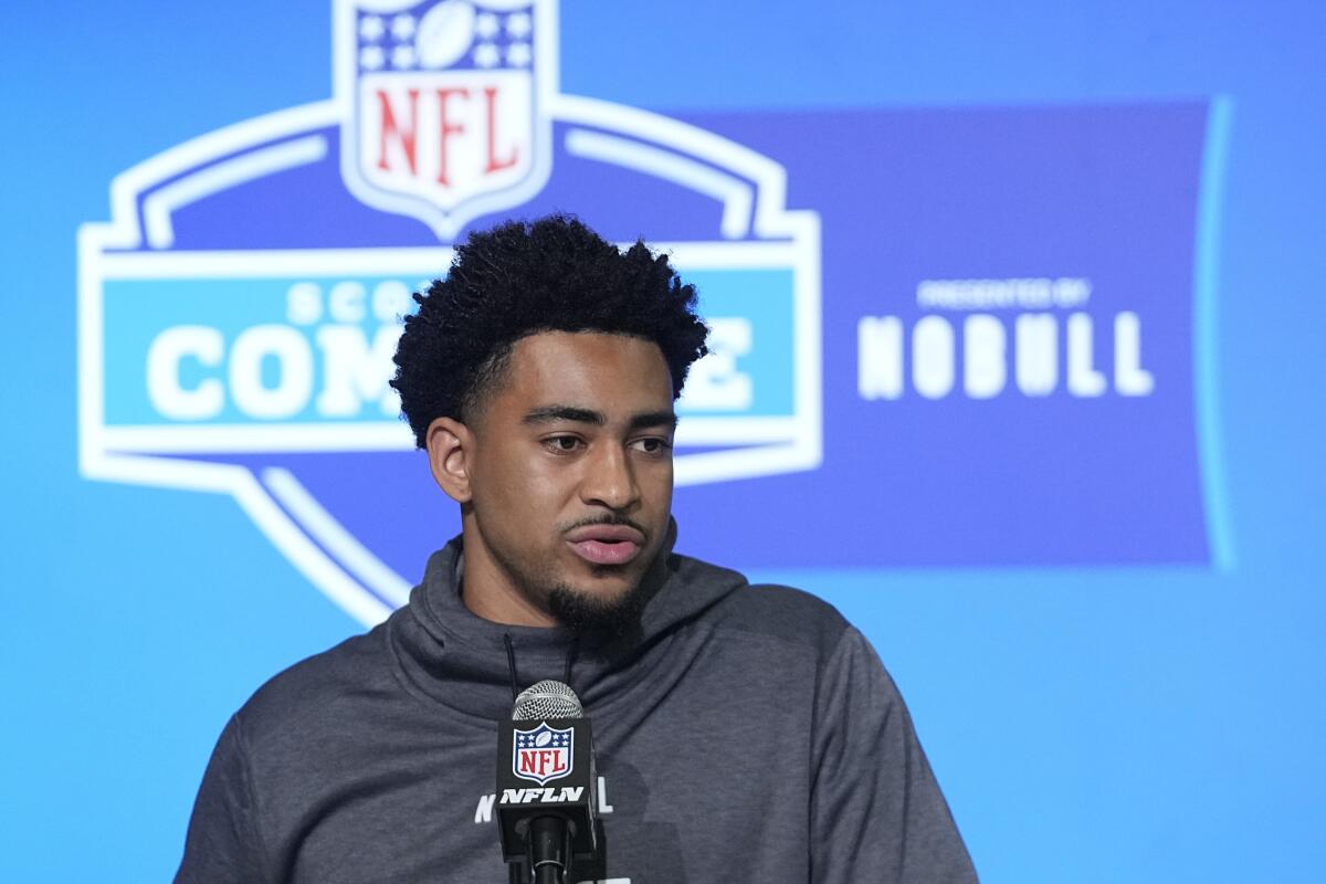 Alabama quarterback Bryce Young speaks during a news conference.