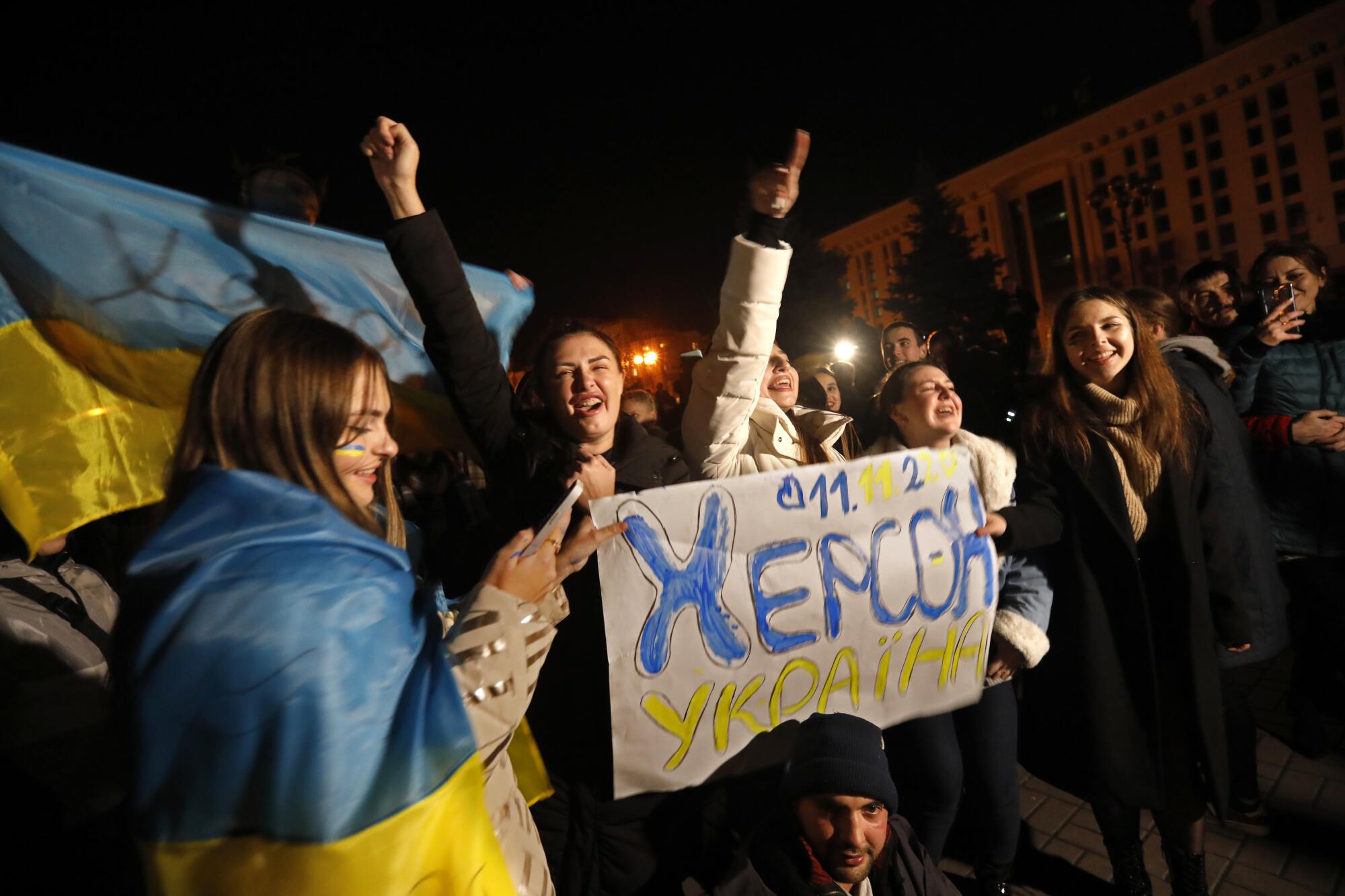 Ukrainians gather in Independence Square in Kyiv, Ukraine to celebrate the withdrawal of Russian troops from Kherson