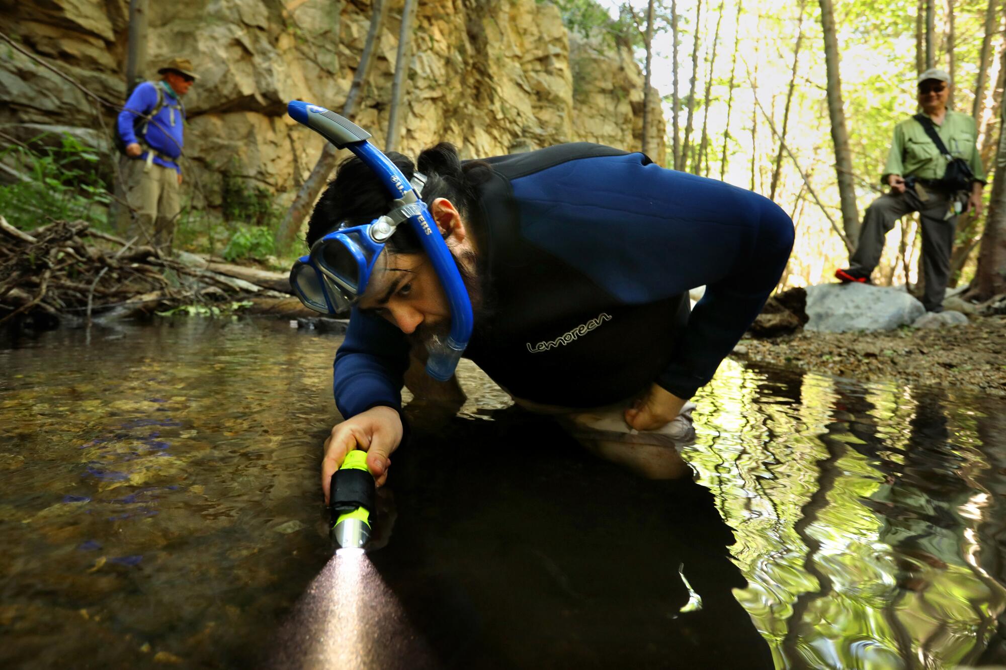 Angel Pinedo looks for rainbow trout and other fish in the Arroyo Seco.
