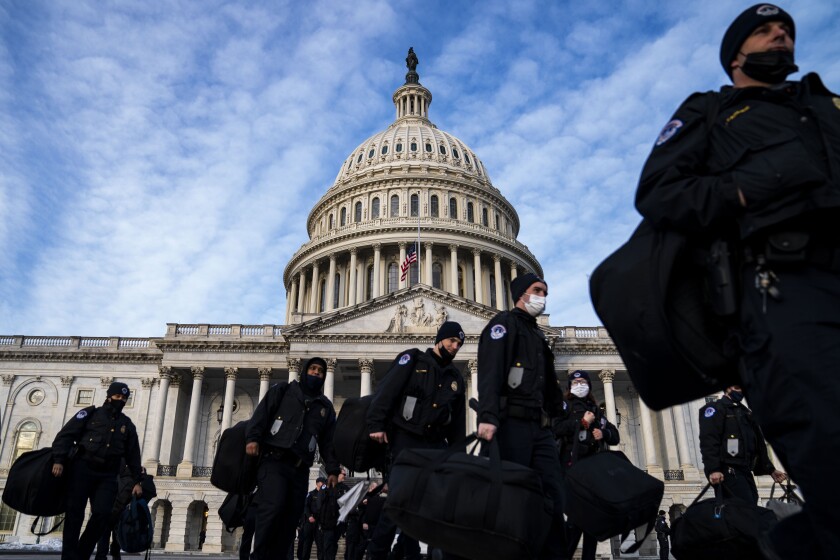Police outside the Capitol on Thursday.