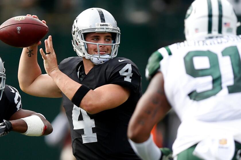 Raiders quarterback Derek Carr passed for 333 yards and four touchdowns in a win over the Jets on Sunday.