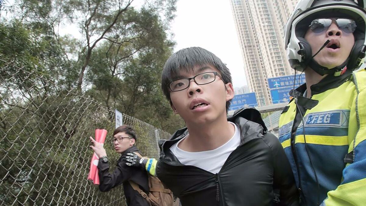 Democracy activist Joshua Wong was detained by Hong Kong police in May 2016.