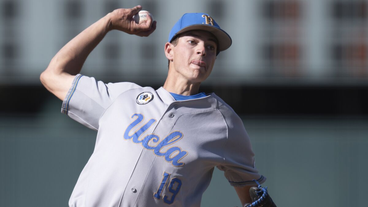 UCLA pitcher Jared Karros pitches against USC.