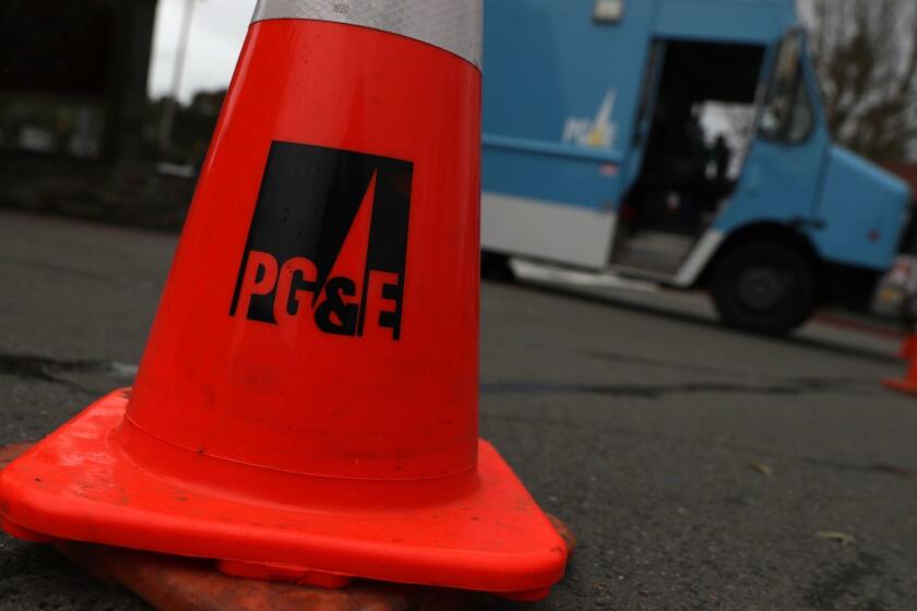 FAIRFAX, CALIFORNIA - JANUARY 17: A traffic cone sits next to a Pacific Gas & Electric (PG&E) truck on January 17, 2019 in Fairfax, California. PG&E announced that they are preparing to file for bankruptcy at the end of January as they face an estimated $30 billion in legal claims for electrical equipment that might have been responsible for igniting destructive wildfires in California. (Photo by Justin Sullivan/Getty Images) ** OUTS - ELSENT, FPG, CM - OUTS * NM, PH, VA if sourced by CT, LA or MoD **