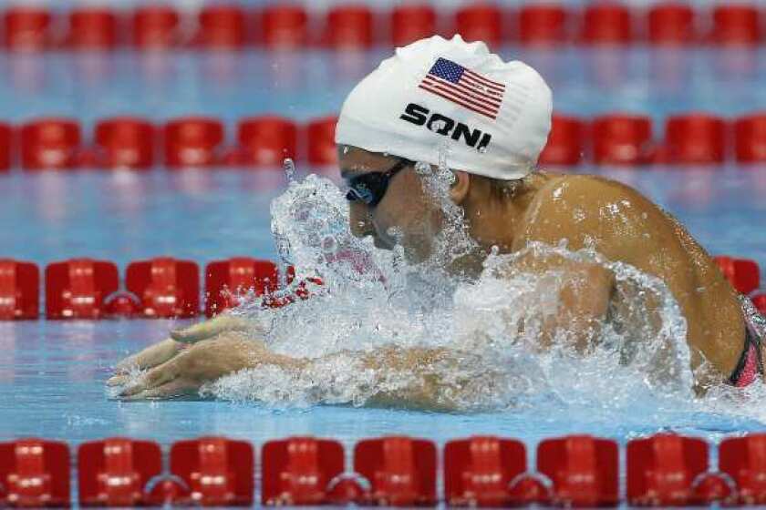 Rebecca Soni of the United States on her way to a world record in the women's 200-meter breaststroke.